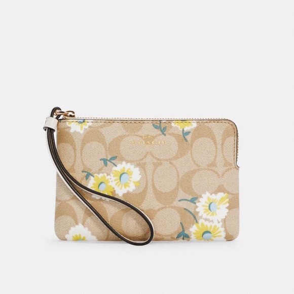 Coach Handbags - NWT COACH Corner Zip Wristlet Signature Daisy